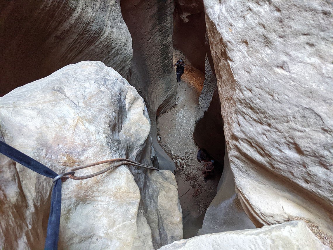 Looking down the second rappel in Englestead Canyon